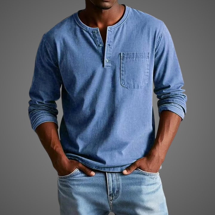 Denim blue Henley shirt with rolled cuffs and buttoned placket