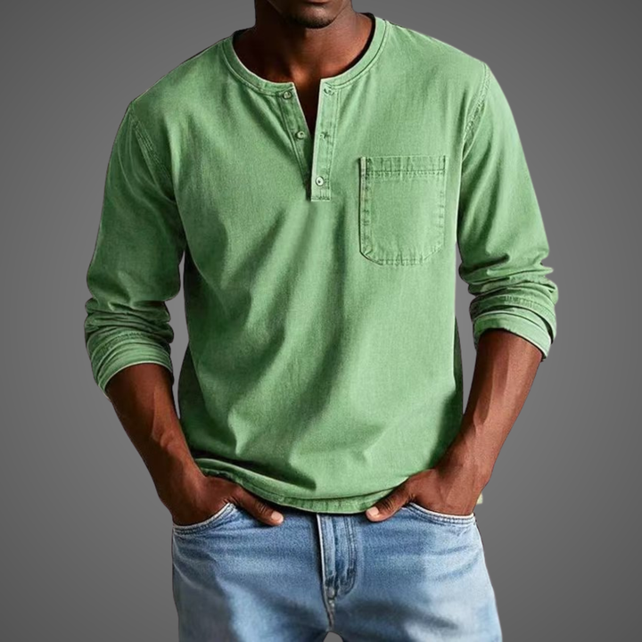 Sage green long-sleeve Henley with chest pocket and round neckline