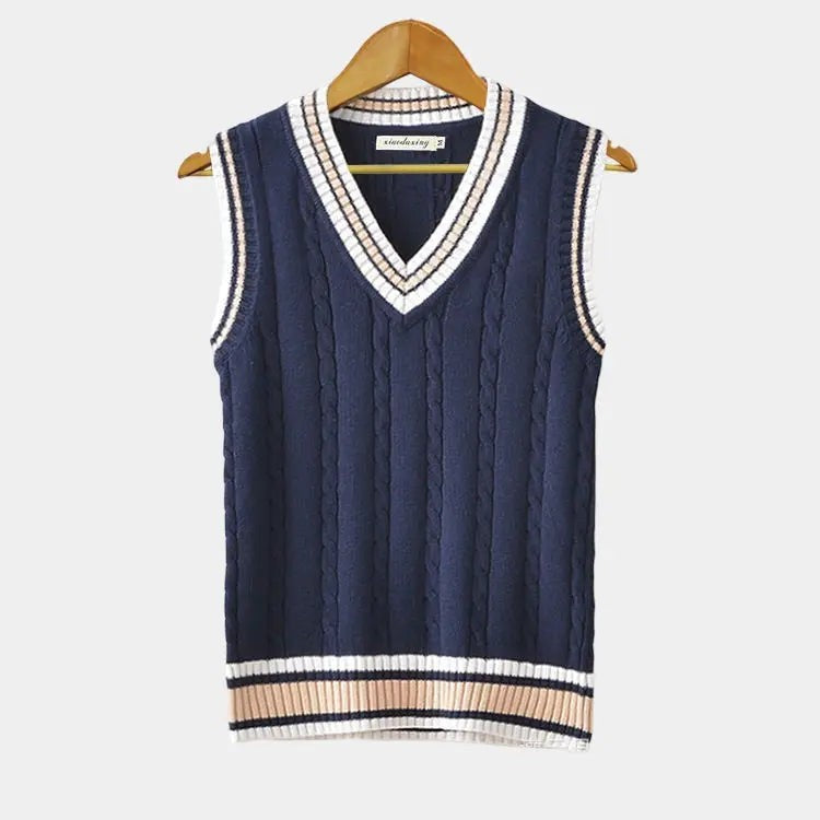 Navy cable-knit sweater vest featuring white and beige striped ribbed trim