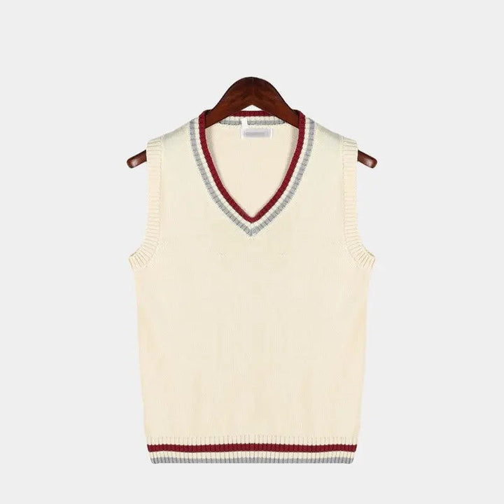 Cream sweater vest with red and grey striped V-neck and hem trim