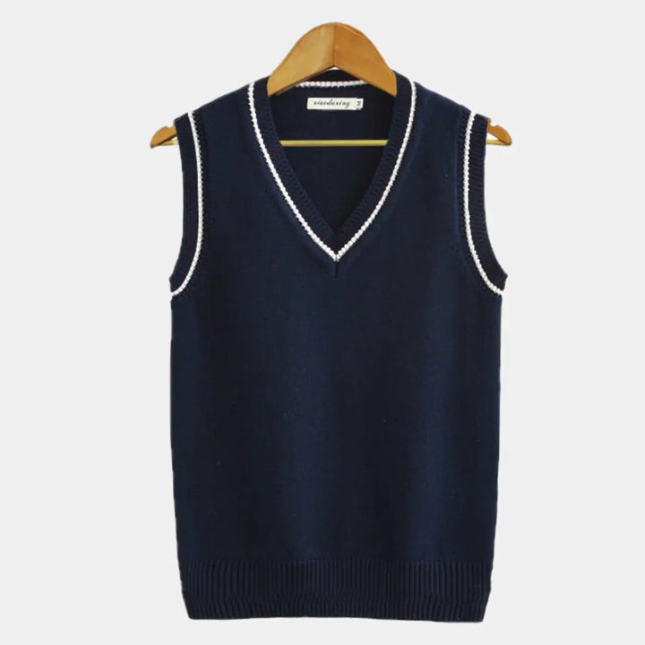 Navy knitted sweater vest with contrasting white ribbed V-neck edging