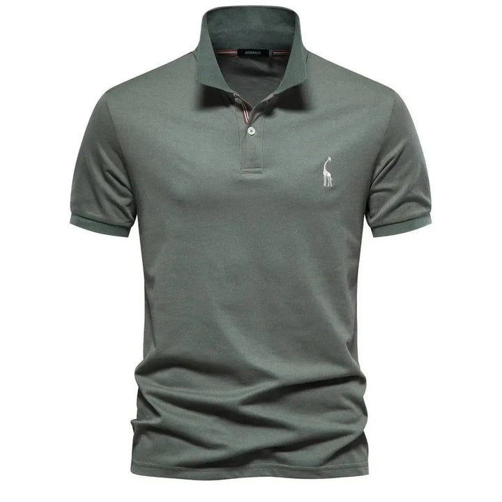 Sage green polo shirt with contrast placket and subtle giraffe embroidery