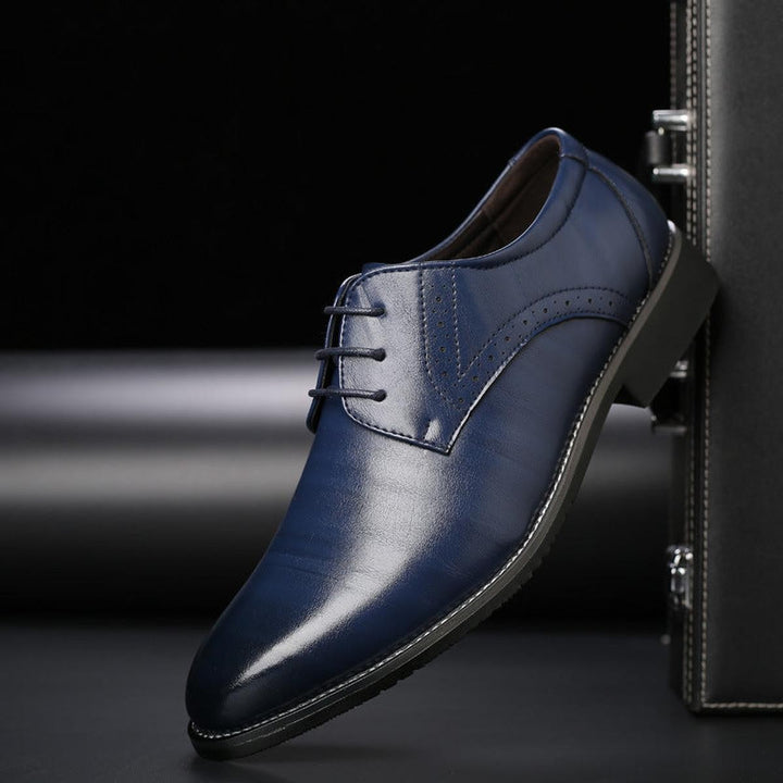 Navy blue leather formal lace-up shoe with subtle brogue perforations