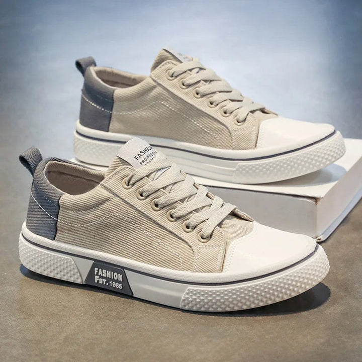 Beige canvas trainers with grey heel panels and durable white rubber outsoles
