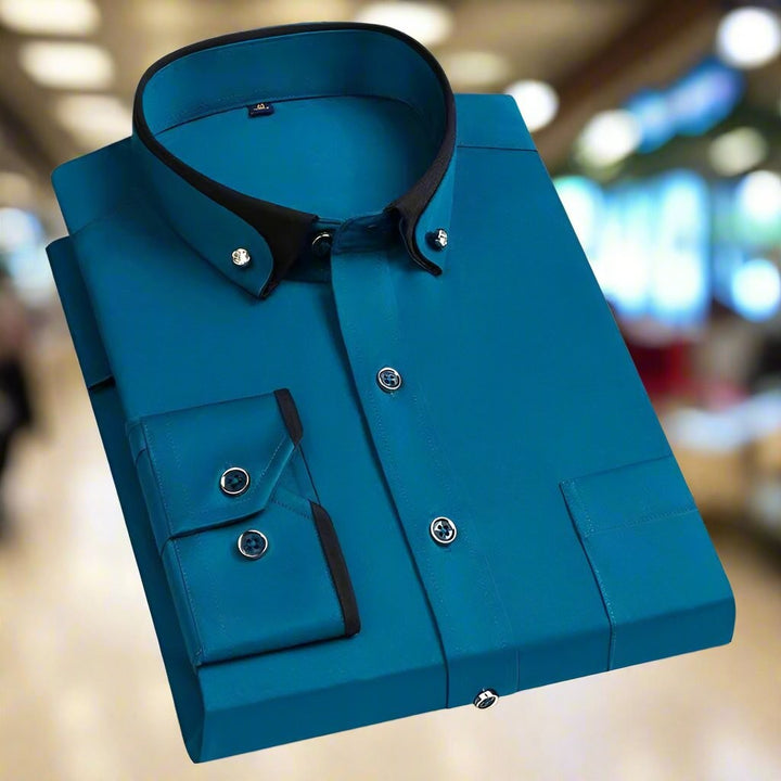 Teal long-sleeve shirt with black trim collar and button-down cuffs