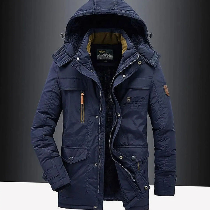 Navy hooded winter parka featuring fleece lining and zip fastening