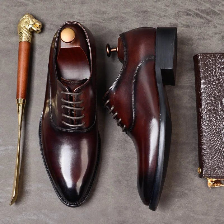 Side and top view of burgundy leather Oxford shoes with stacked heel