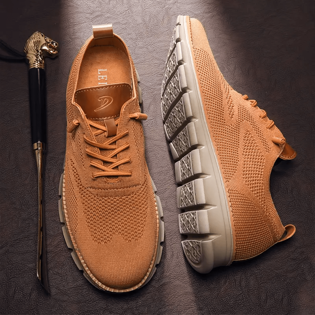 Tan knitted lace-up trainers with chunky ridged sole and leather heel tab