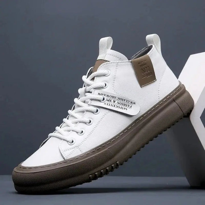 White high-top canvas trainers with brown sole and lace-up front, side view