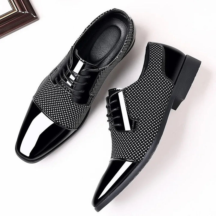 Men's patent-toe Oxford shoes with textured lace-up panels and pointed toe
