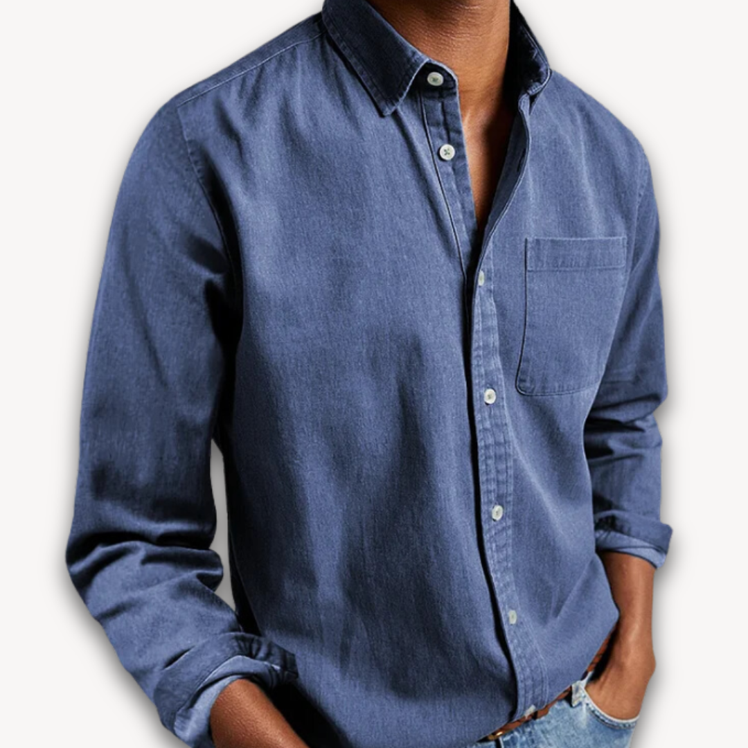 Blue denim-wash long-sleeve shirt with button-down collar and chest pocket