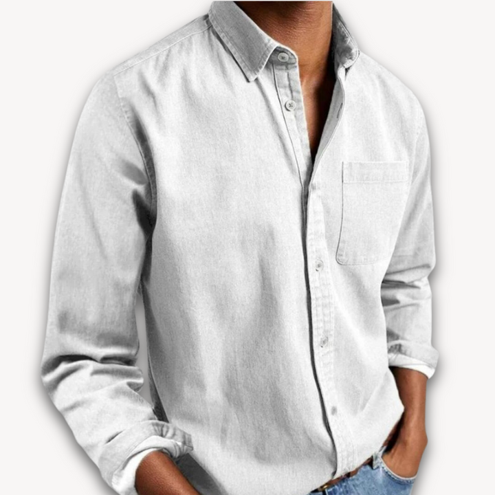 White long-sleeve button-down shirt with faded wash and chest pocket detail