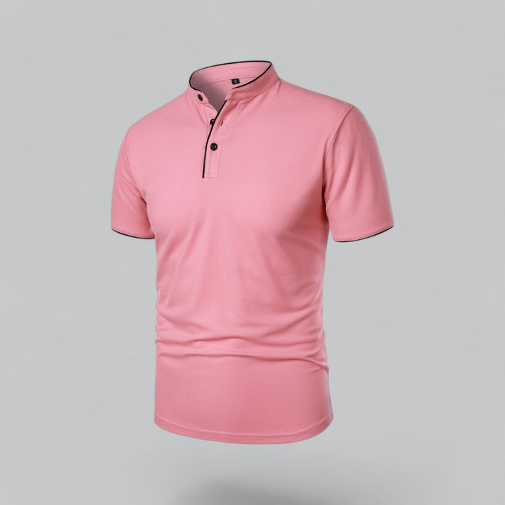 pink collarless polo shirt with black button placket, angled front view