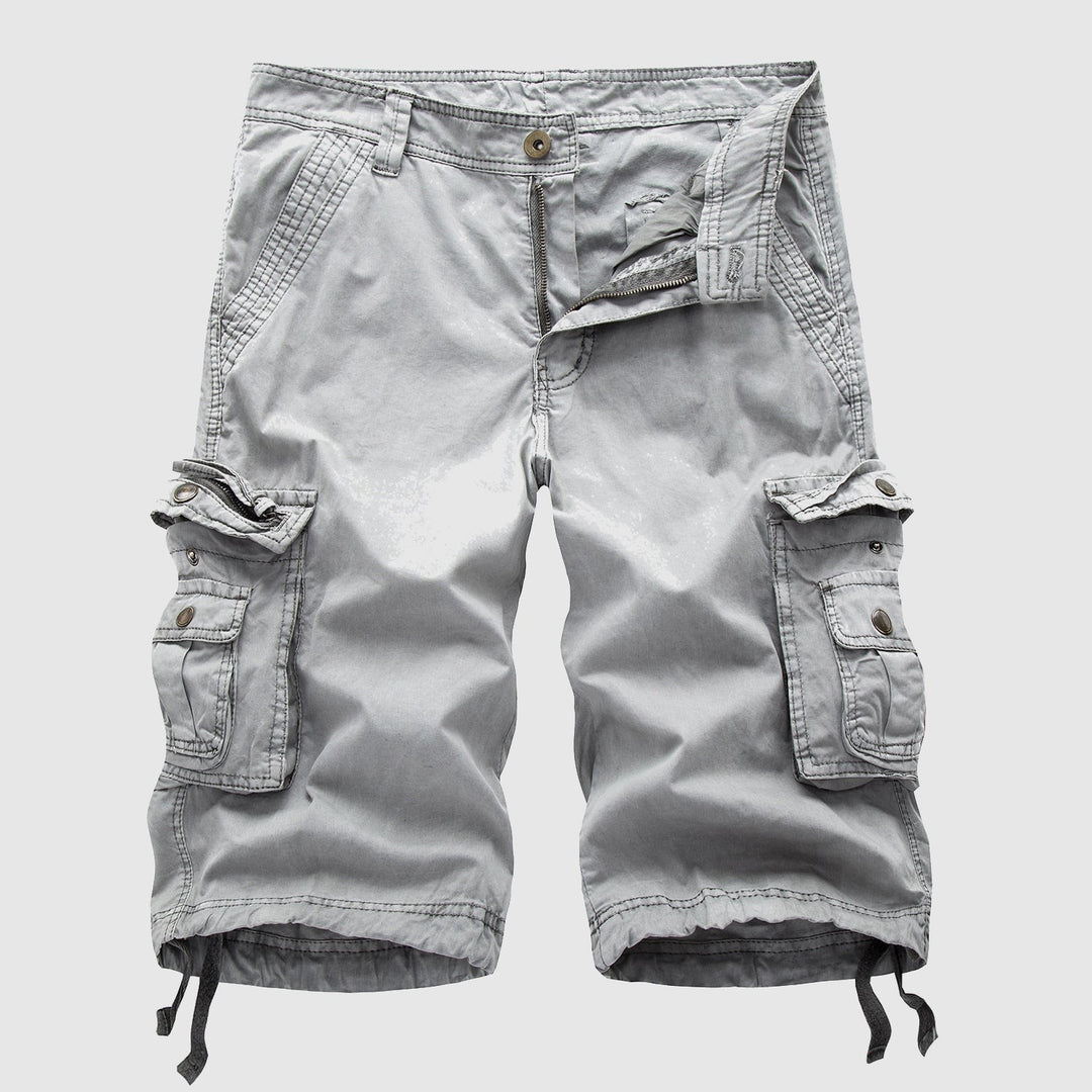 Pale grey cargo shorts with worn-in texture and drawstring cuffs