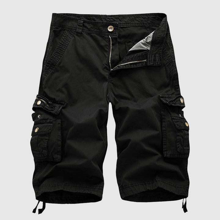 Black cargo shorts featuring twin side pockets and a zip fly