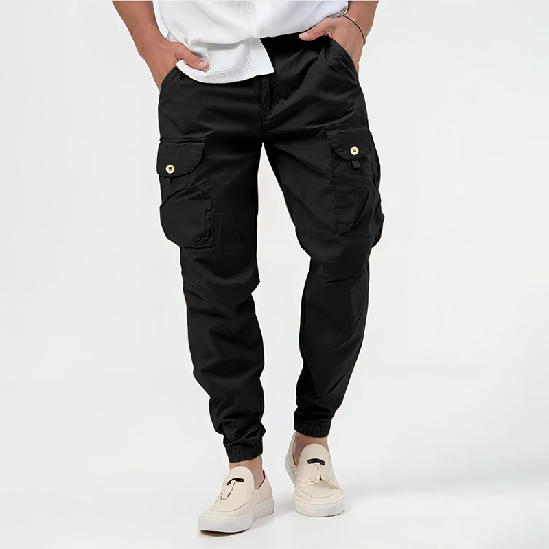 Black tactical cargo joggers featuring buttoned side pockets and slim tapered fit