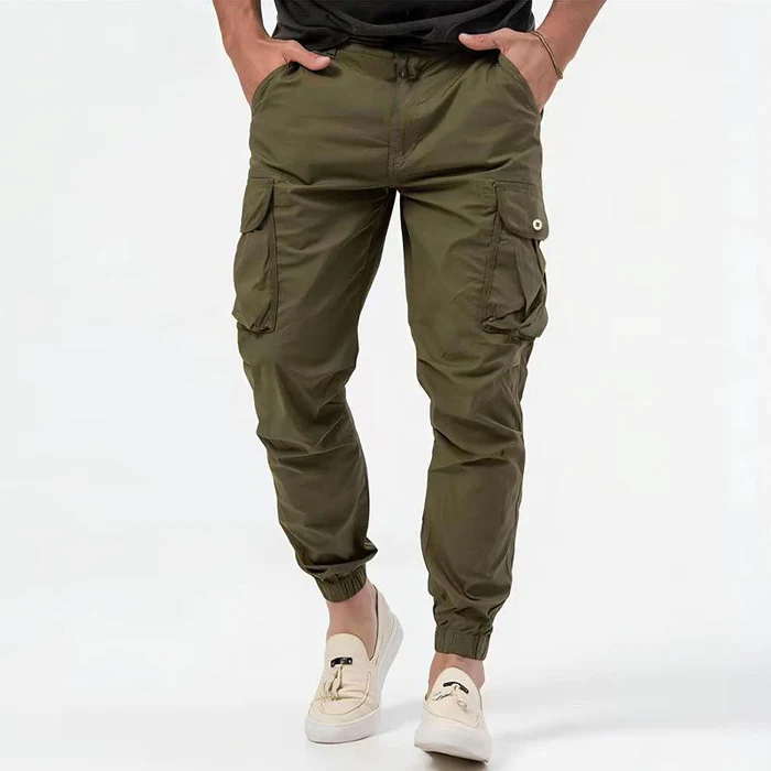 Olive green cargo joggers with buttoned pockets and elasticated ankle cuffs