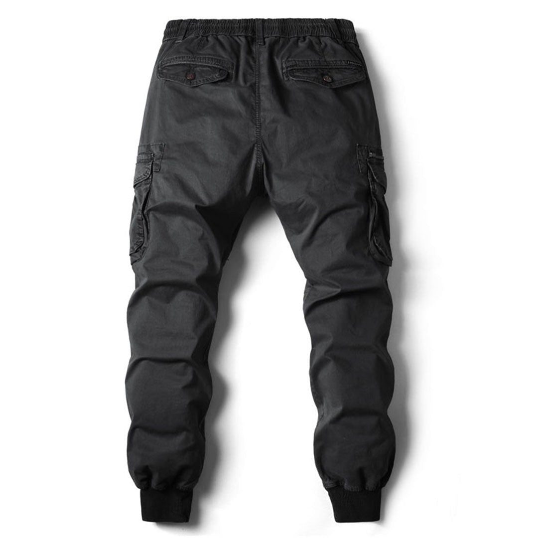 Charcoal cargo trousers with elasticated waist and buttoned pockets, rear view