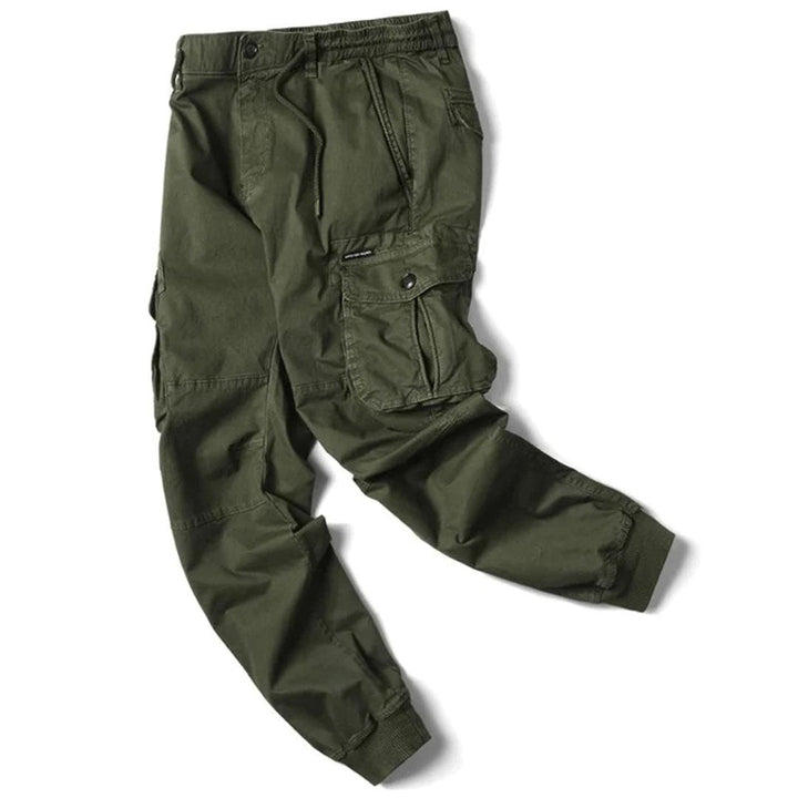 Olive green cargo trousers with elasticated waist, laid flat