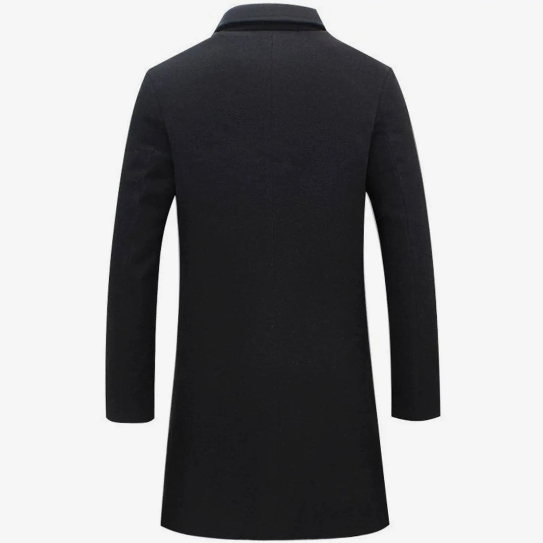 Rear view of black wool-blend overcoat showing tailored fit and long sleeves