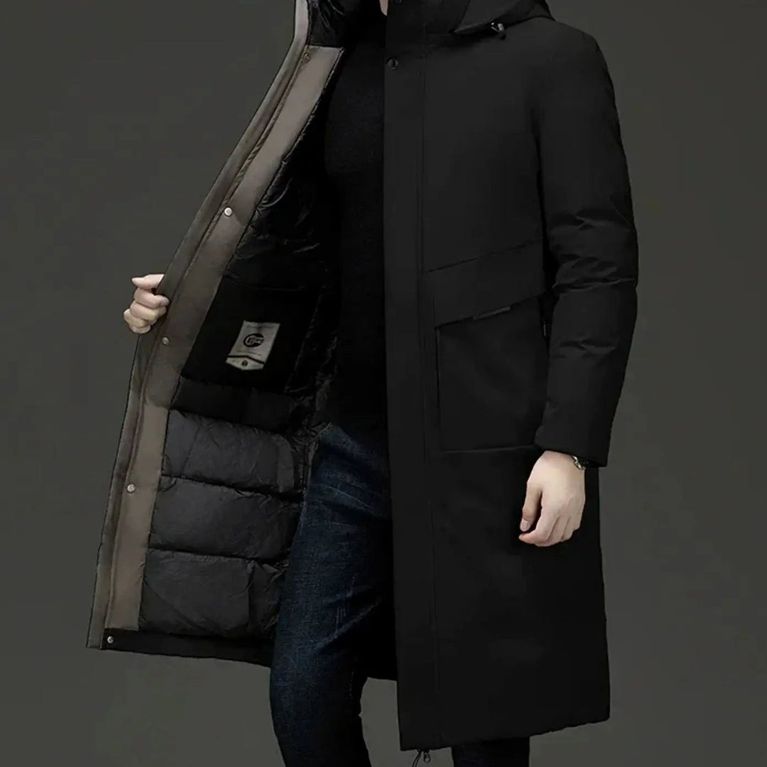Black hooded parka coat worn open showing padded lining and khaki trim
