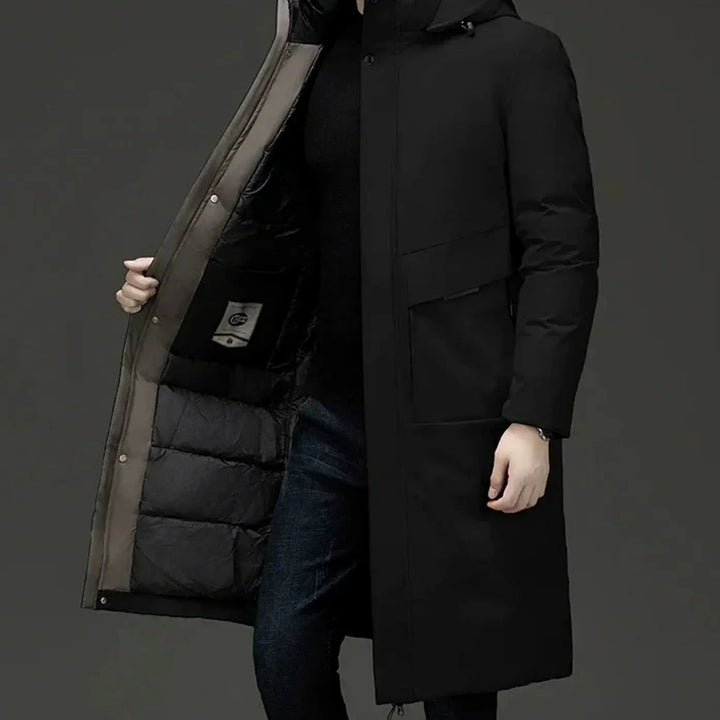 Black hooded parka coat worn open showing padded lining and khaki trim