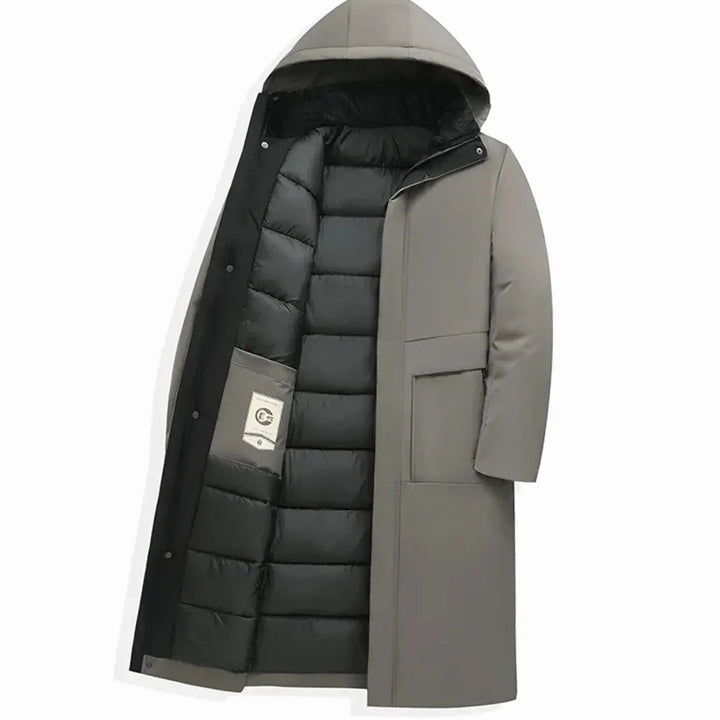 Grey hooded long puffer coat unzipped to reveal black padded lining