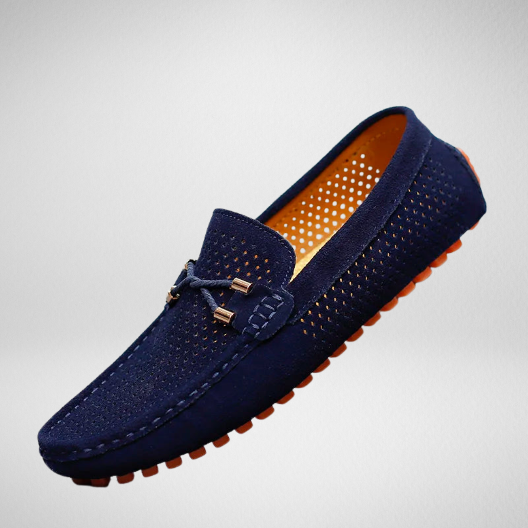 Navy suede perforated driving loafers with orange rubber pebbled sole