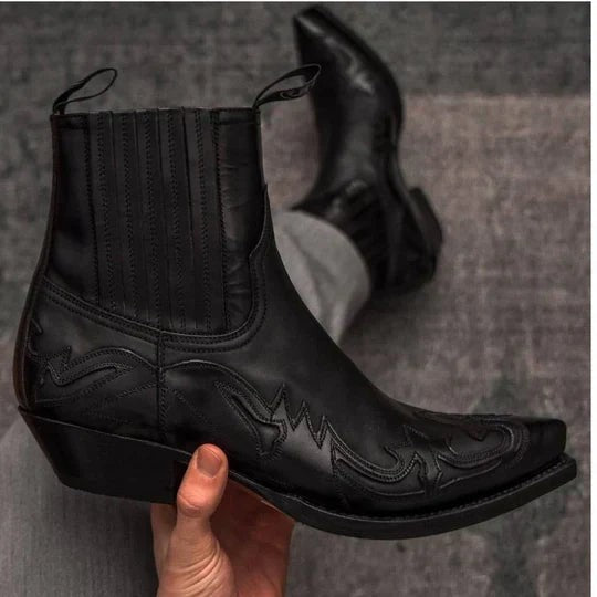 Black leather cowboy ankle boot with pointed toe and flame stitching detail