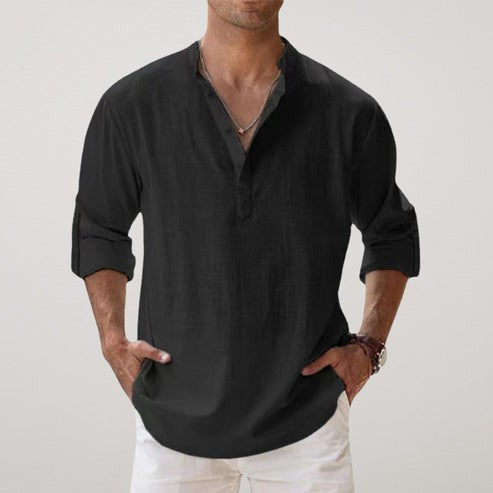 Black linen grandad-collar shirt paired with rolled sleeves for a casual look