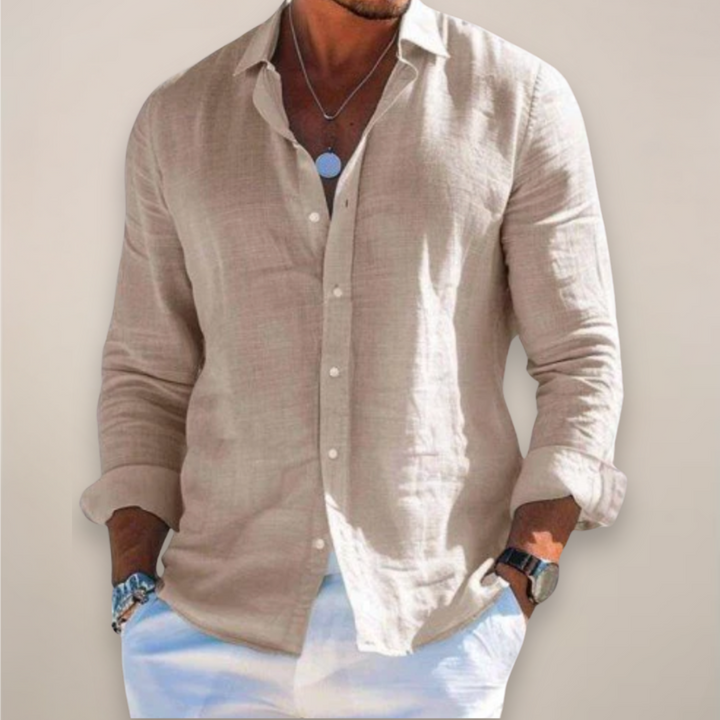 Beige linen long-sleeve shirt with lightweight fabric and rolled-up sleeves