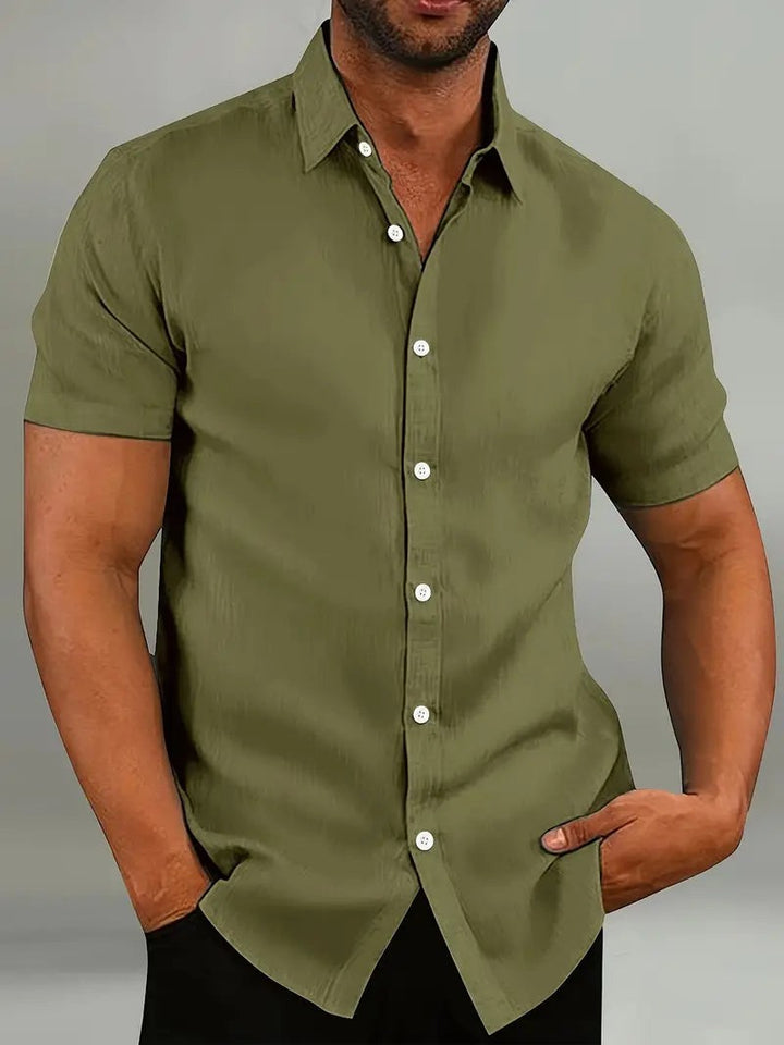 Olive green short-sleeve shirt with button-front and slim tailored cut
