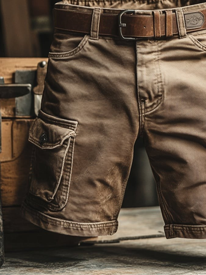 Detailed view of beige cargo shorts highlighting side pocket and stitched seams