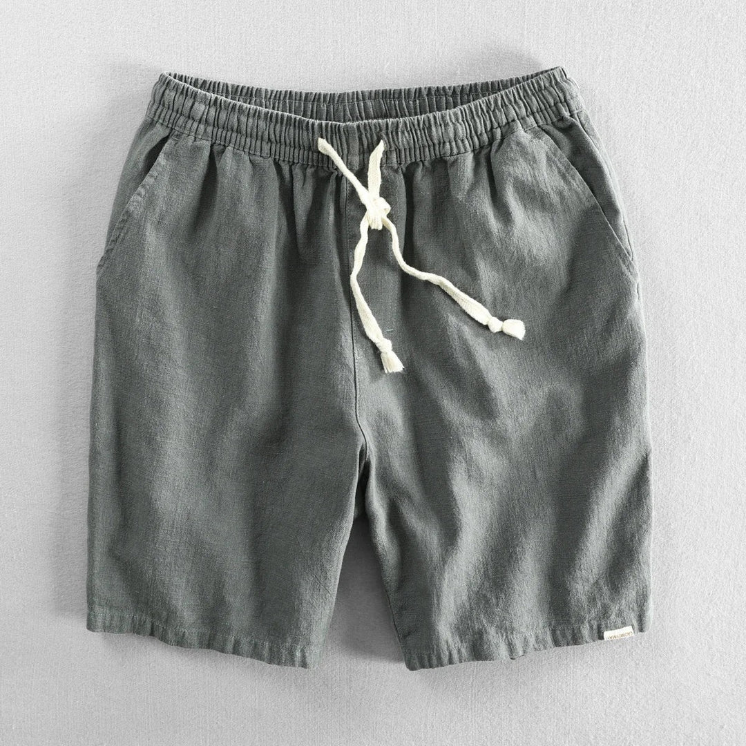 Khaki green linen shorts with drawstring waist and side pocket detail