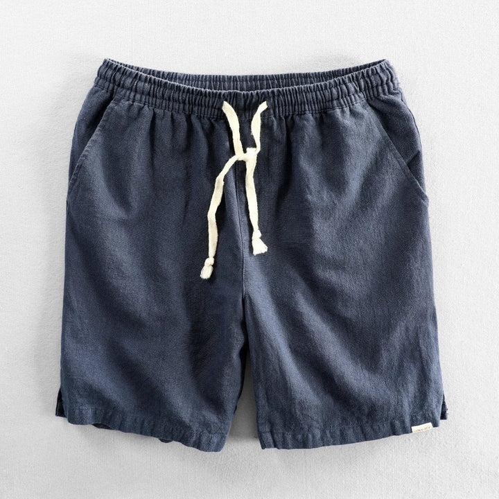 Navy linen shorts with elastic waistband and natural cotton drawstring