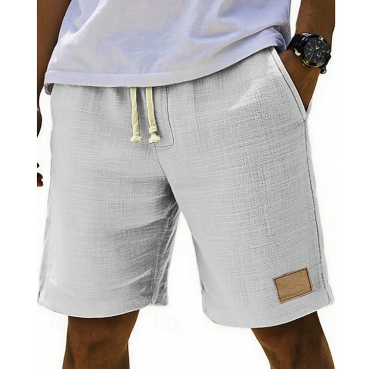 Light grey linen-blend shorts with drawstring waist and leather patch detail