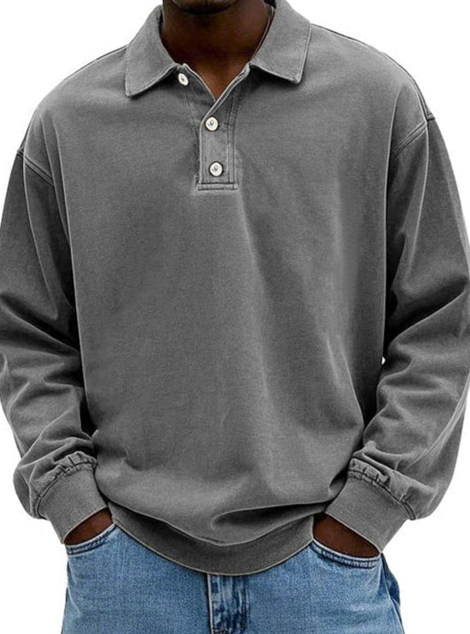 Grey long-sleeve polo shirt with buttoned collar and relaxed oversized fit