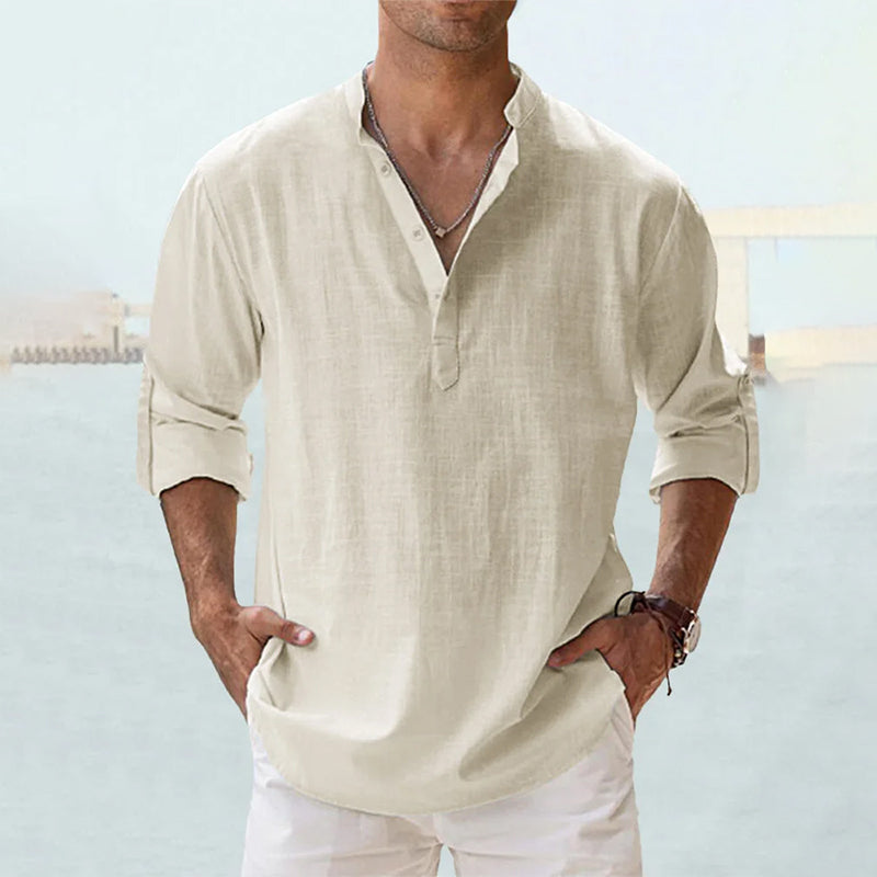 Cream linen Henley shirt with buttoned neckline and rolled cuffs