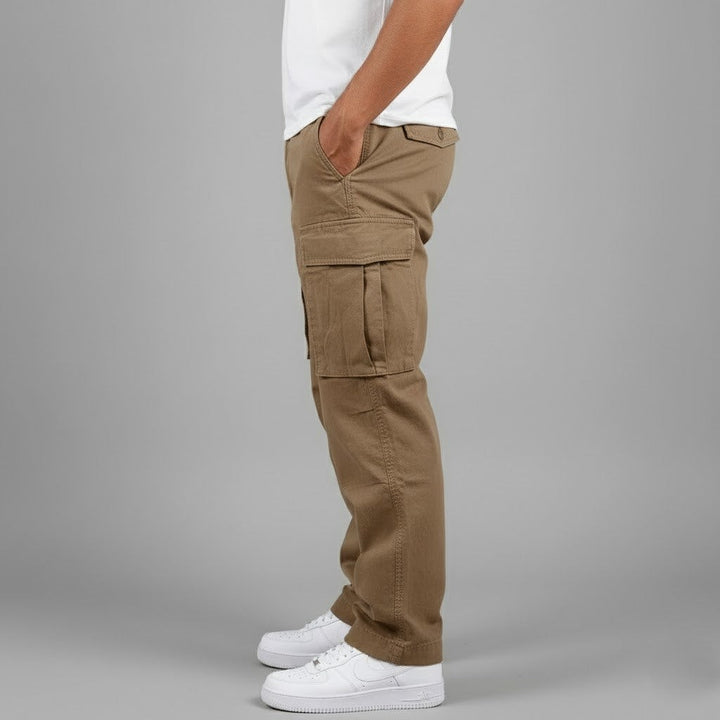 Side profile of khaki relaxed fit cargo trousers showing flap pocket