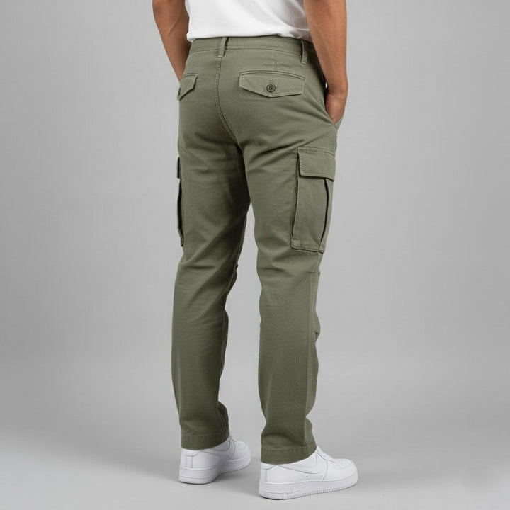 Back view of olive green cargo trousers showing button-flap pockets