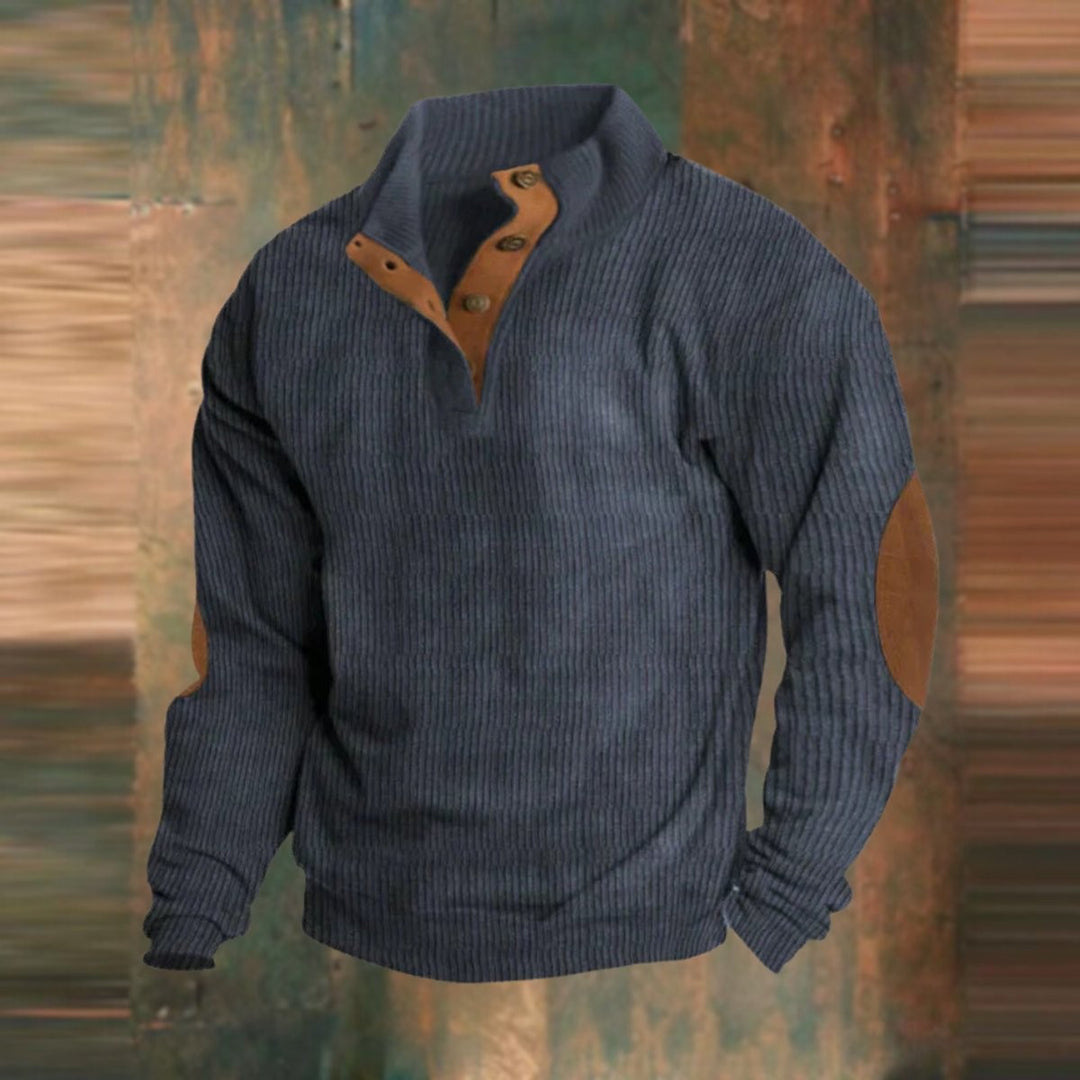 Navy ribbed knit quarter-zip jumper featuring tan suede elbow patches