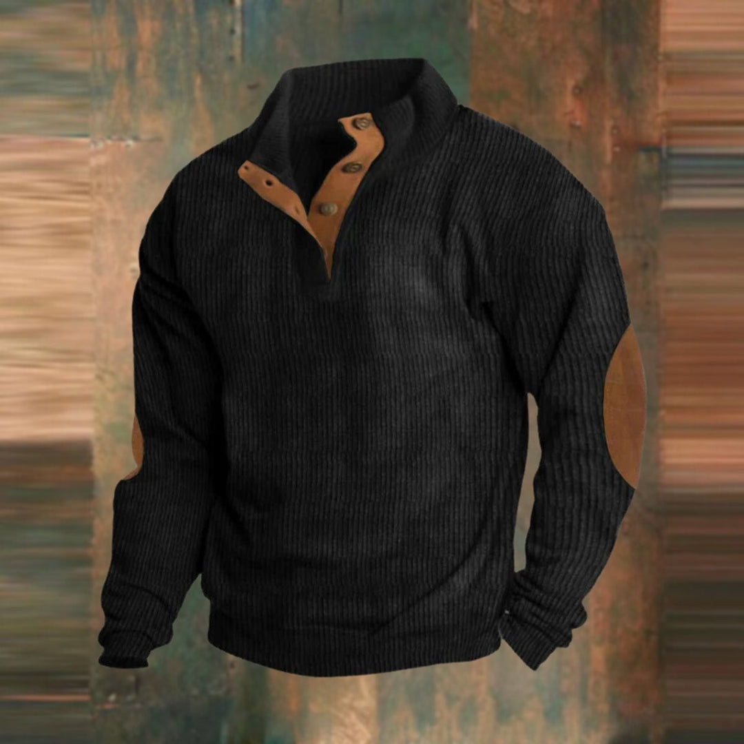 Black ribbed knit pullover jumper with suede elbow patches and stand collar