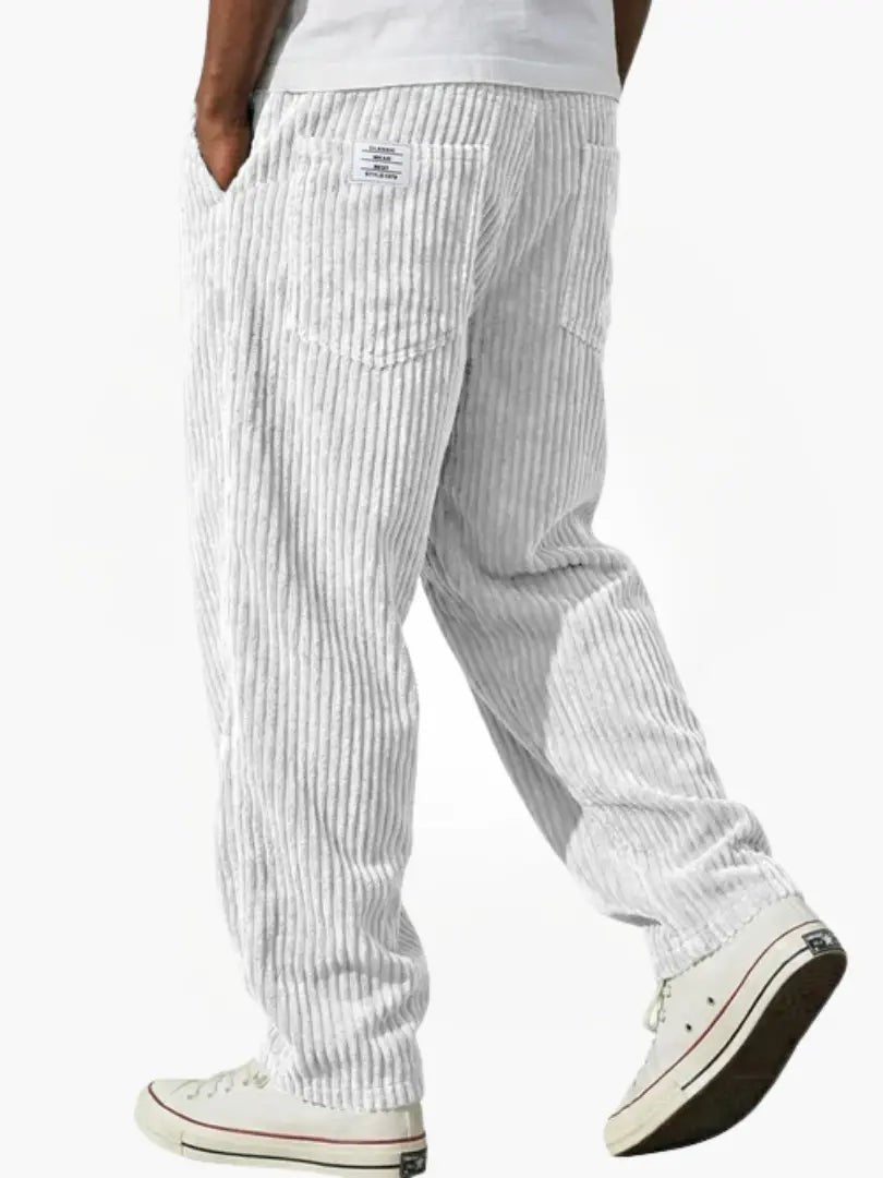 White ribbed corduroy trousers with relaxed silhouette and back pockets