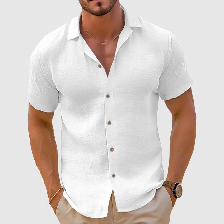 White short-sleeve button-up shirt with classic collar and wooden buttons