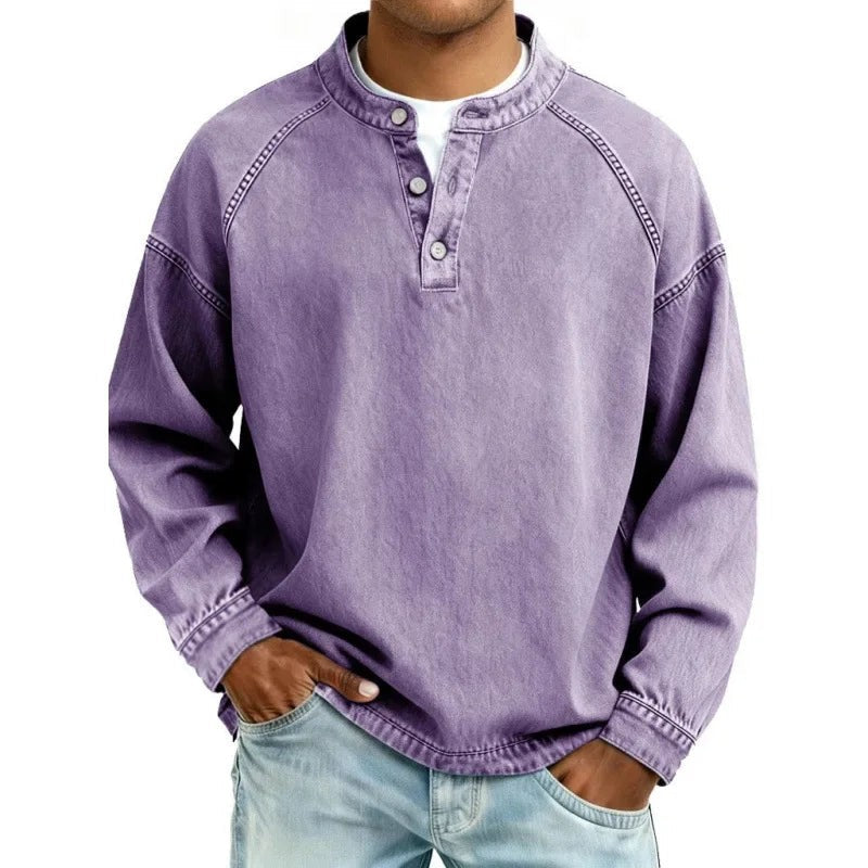 Lilac washed denim henley top featuring button neckline and long sleeves