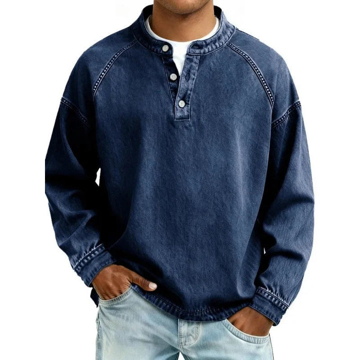 Navy denim henley shirt with stand-up collar and stitched raglan seams
