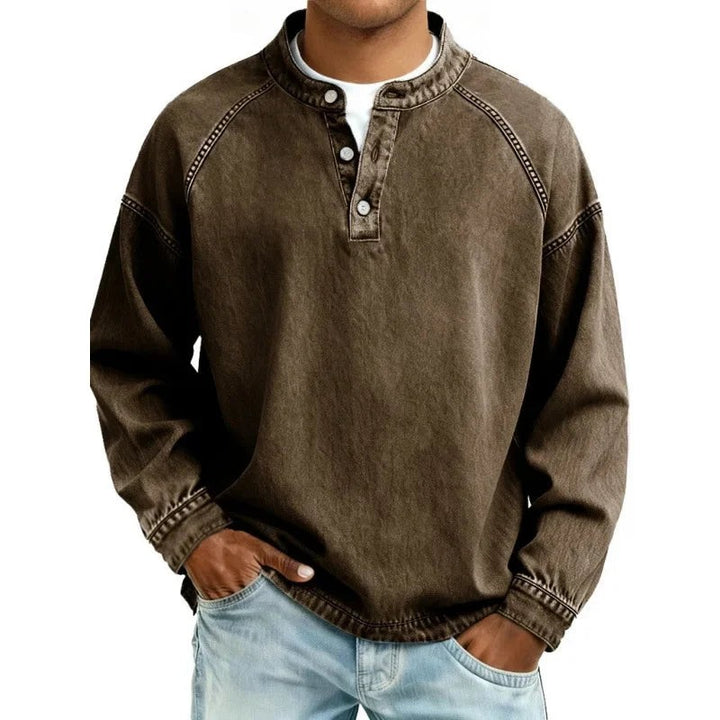Brown vintage-wash denim shirt with button neckline and long sleeves