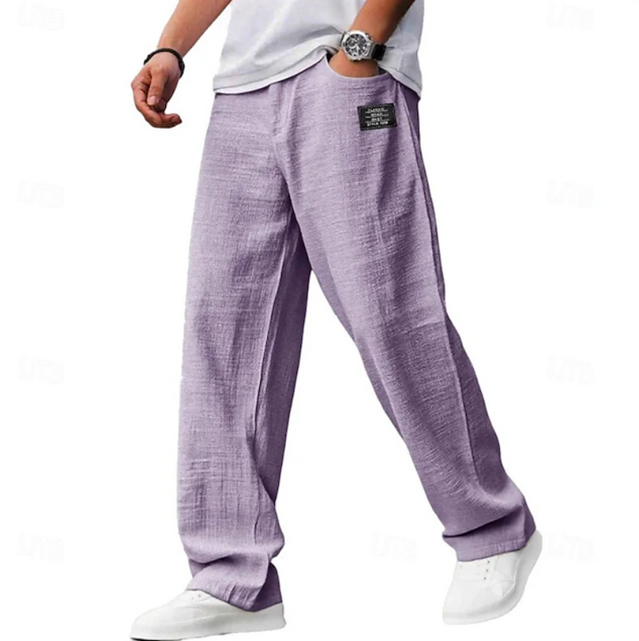 Lilac linen-blend wide-leg trousers paired with white trainers for casual wear