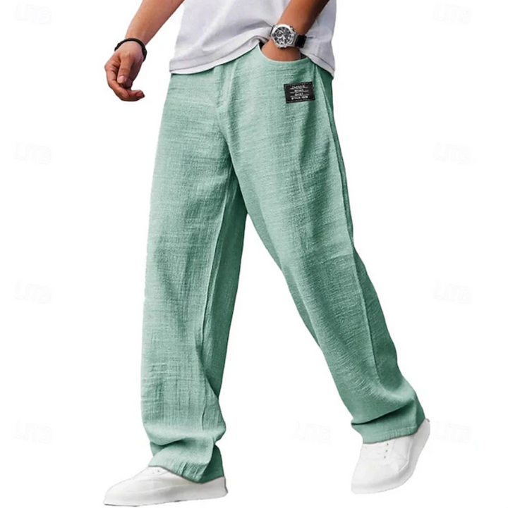 Mint green linen-blend wide-leg trousers with a soft textured finish