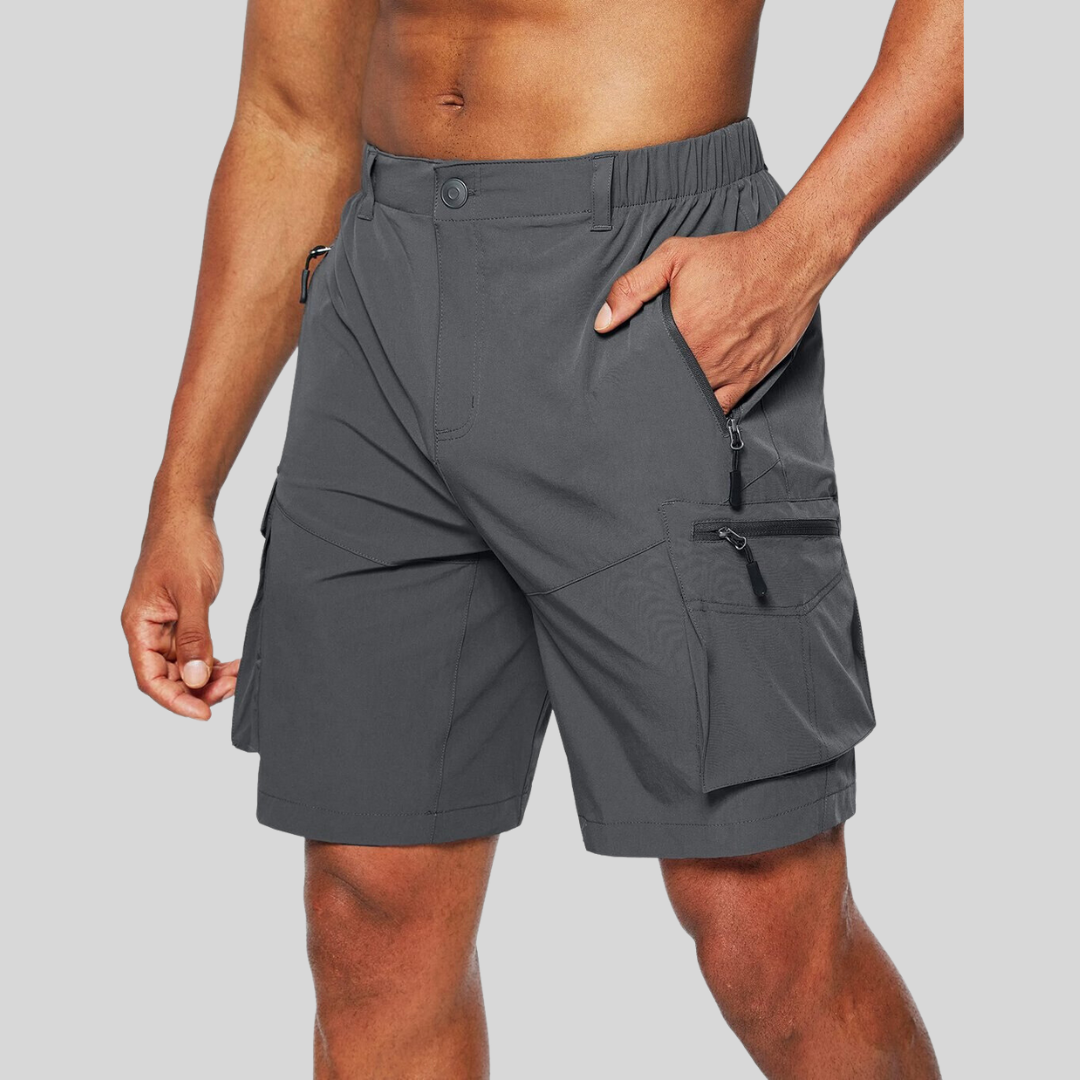 Charcoal grey cargo shorts with zip pockets and elasticated waistband on model